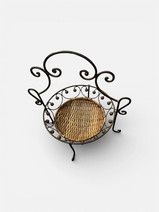 Vintage wicker and wrought iron basket