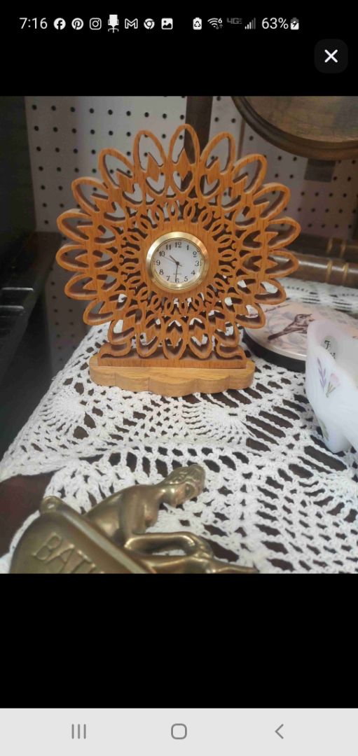 brown unbranded handcrafted wooden clock