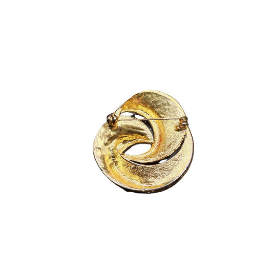Vintage gold toned rays swirl brooch