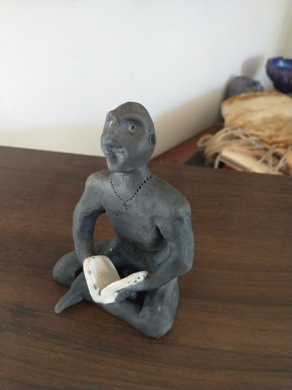 Ceramic Figurine w/book, Raku-fired