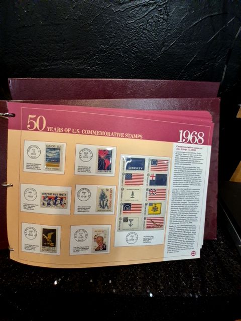 Burgandy United States Postal Service 50 Years of US Commemorative Stamps (2 Albums), 16" × 11.5"