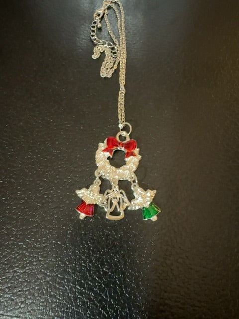 H-wreath w/charms silver tone necklace