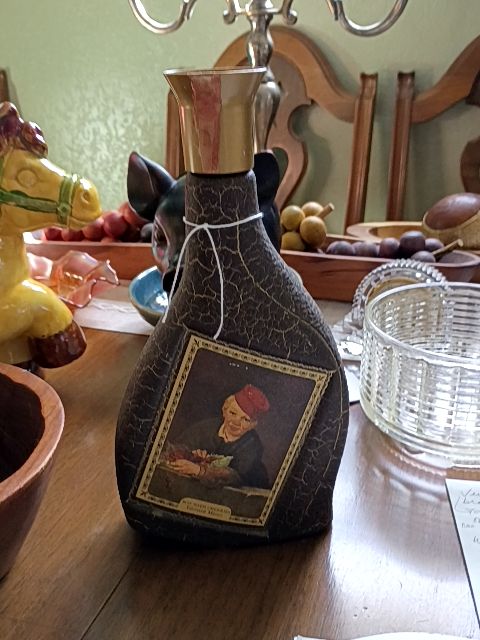 Vintage brown ceramic liquor bottle 5" x 10"
