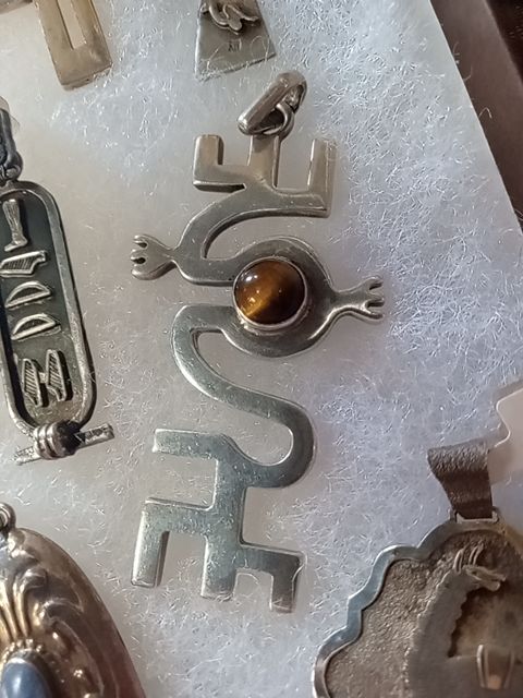 Heavy sterling and tigers eye pendant