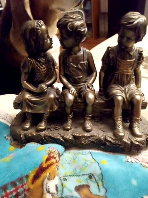Vintage children statue