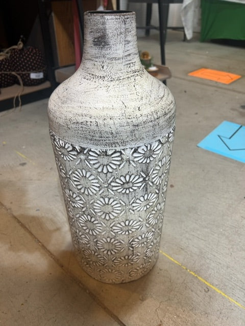 Metal can with flowers
