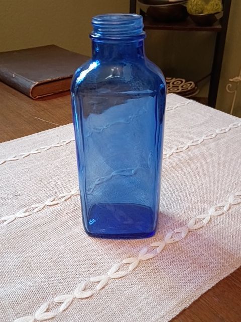 Vintage blue glass medicine bottle 3" x 7"