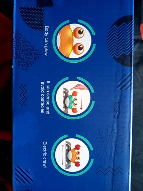 Blue, gray, white, orange Electric light up crab