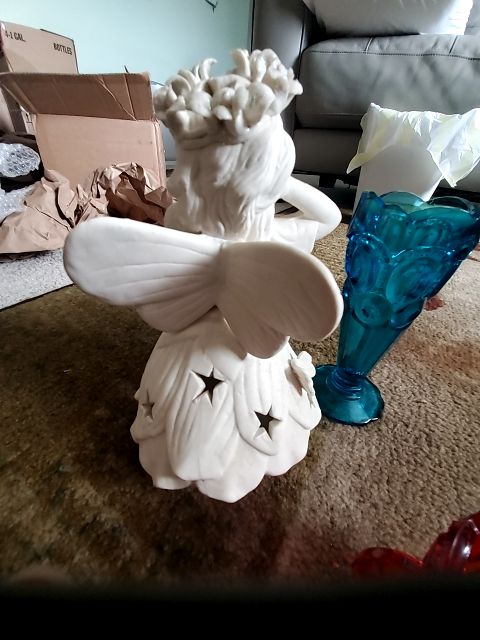 Porcelain fairy tealight holder
