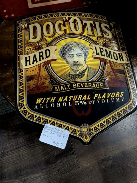 Doc Otis metal sign