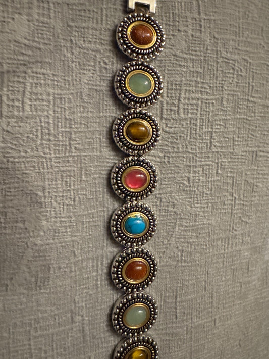 Silver and gold tone Unknown Costume bracelets