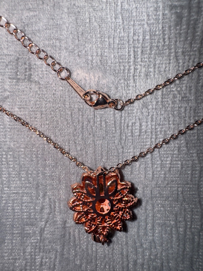 Multi, rose Unknown Rose gold tone setting with multi colored stones