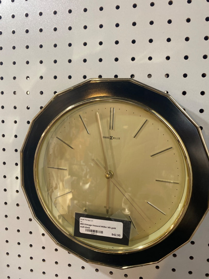 #83 Vintage Howard Miller blk gold wall clock