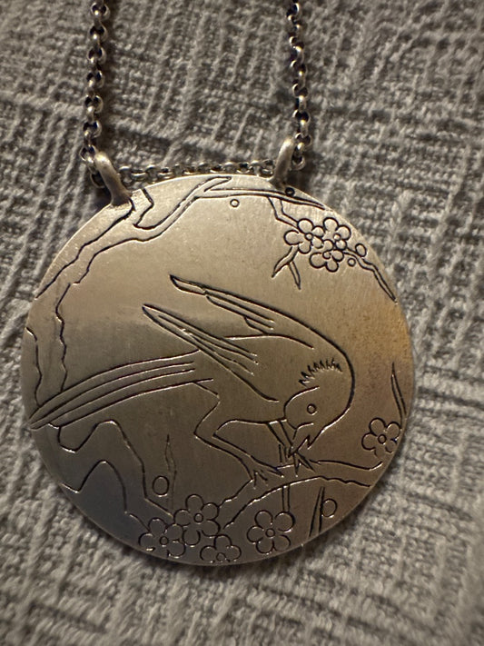Circle bird necklace
