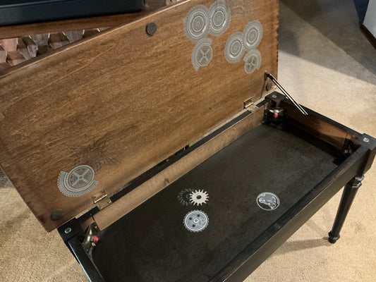 Black and wood Piano bench