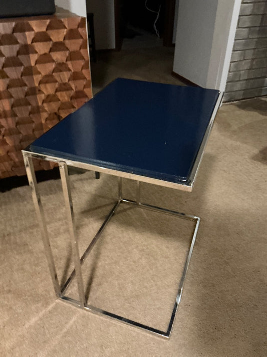 Navy and chrome Design Institute of America C shape table, W20 x L18”xH21”