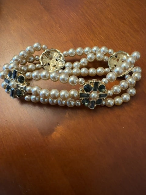 Multi strand faux pearl gold tone stretchy bracelet