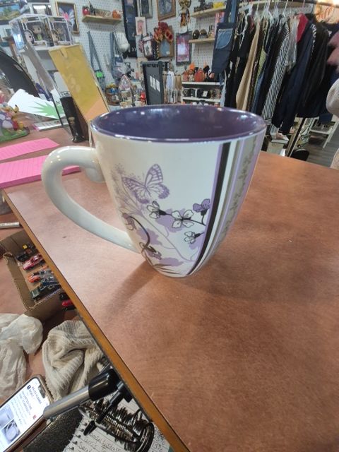 Purple and white coffee mug