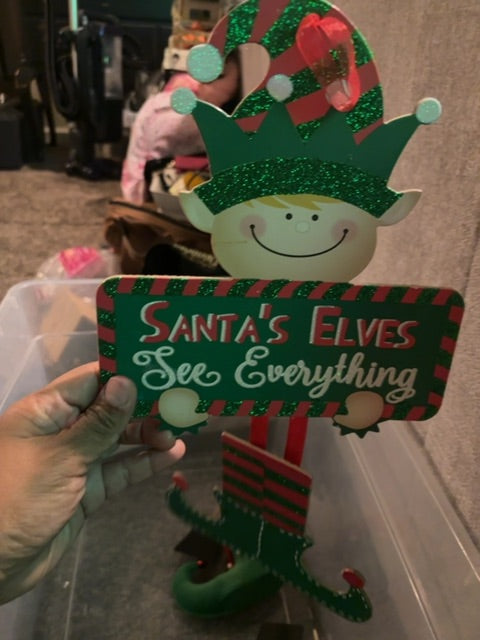 Santa’s elves sign