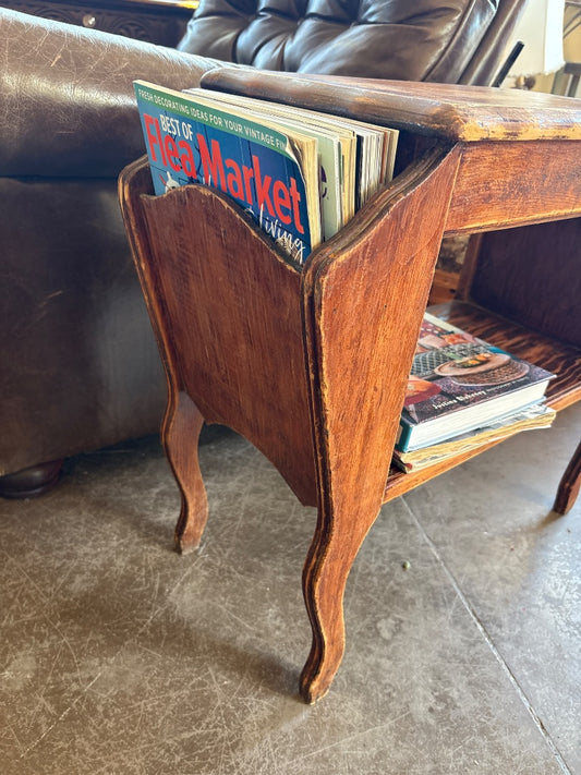 Brown Magazine table, 26” w x 11” d x 22.5 tall