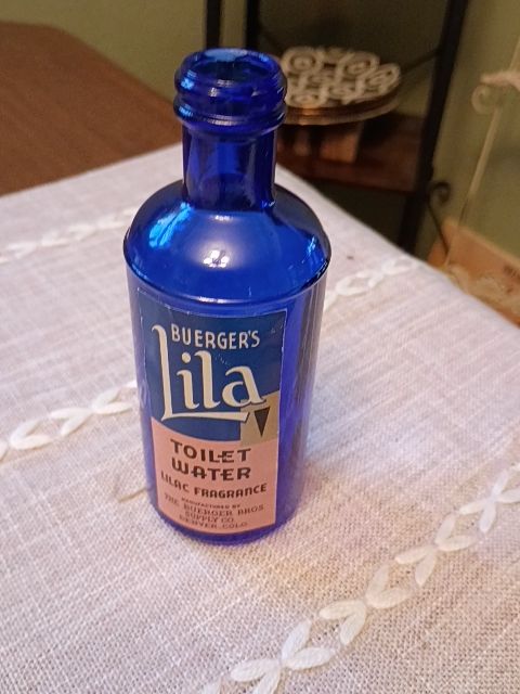 Vintage blue glass bottle toilet water 6"