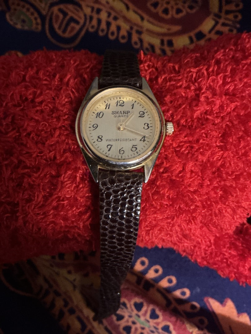 Gold & brown Sharp Brown strap gold face watch
