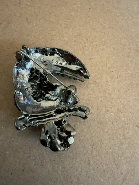 Green toucan brooch