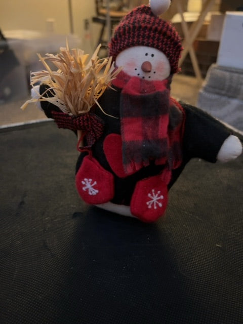 Snowman with broom