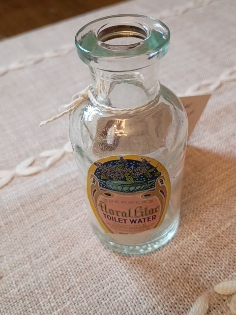 Vintage clear glass toilet water bottle