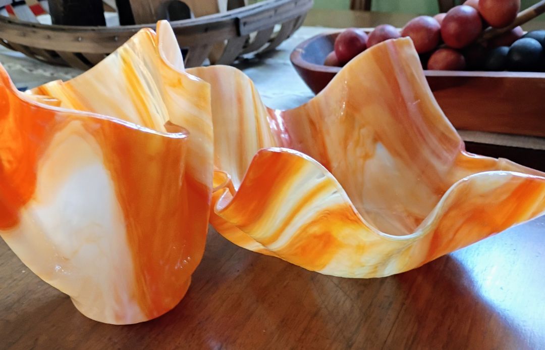 Orange  Pair of orange wavy glass bowls MCM