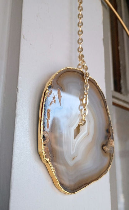 Natural slice brown agate window hanging 12"