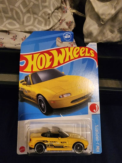 Yellow & Black  HotWheels: 91 Mazda MX-5 Miata