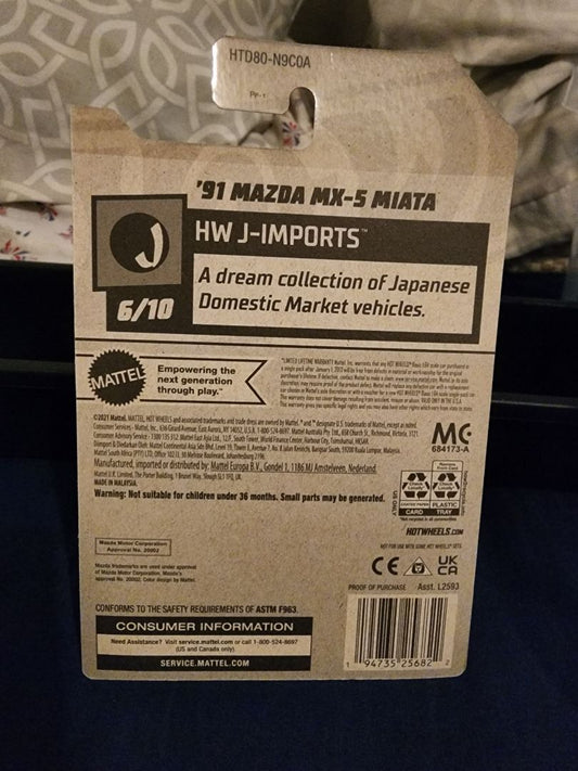 Yellow & Black  HotWheels: 91 Mazda MX-5 Miata