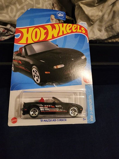 Black  HotWheels: 91 Mazda MX-5 Miata