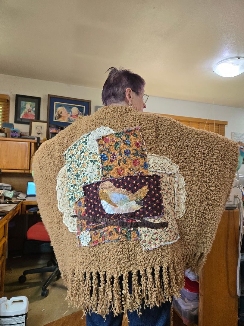 tan  Poncho with bird applique, one size
