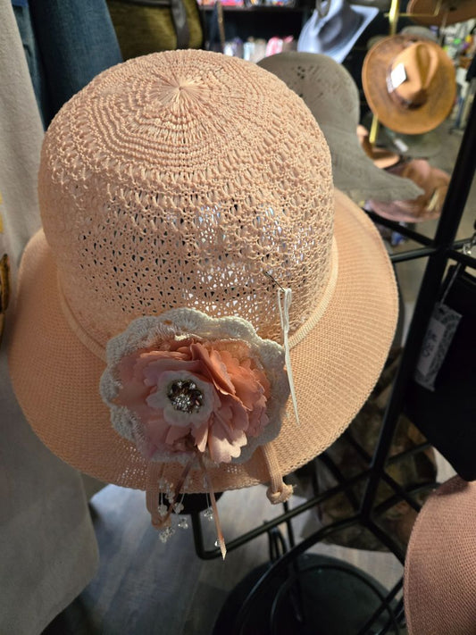 Hat crocheted w coral flower