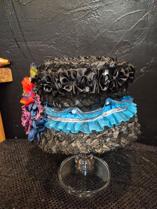 Black Basket Weave Hat with multiple flowers and teal and rhinestone hat band