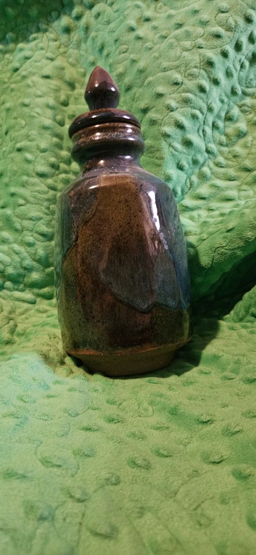 Signed Ceramic jar with lid, 10 inches