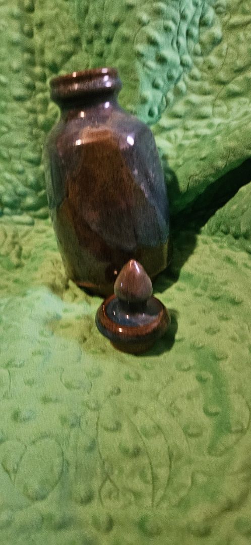Signed Ceramic jar with lid, 10 inches