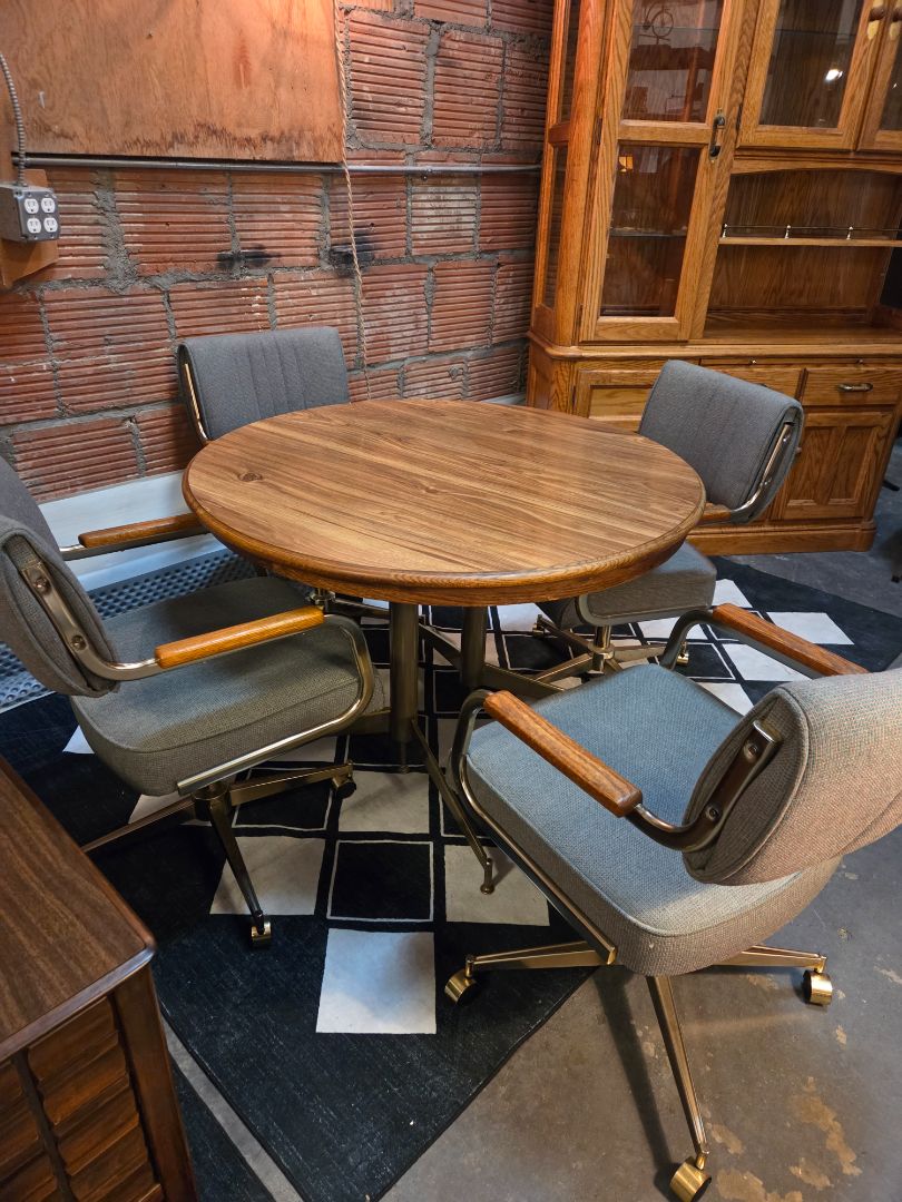 Vintage Round Dining table set with swivel chairs