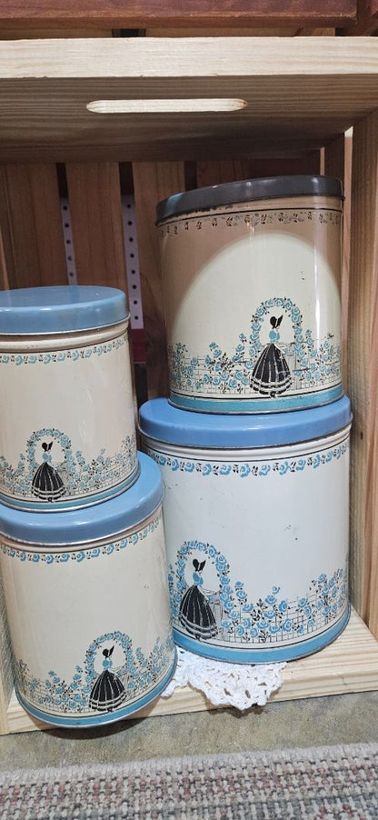 Vintage Tin Canister 4 Pc Set Southern Belle at Rose Trimmed Gate in Blue