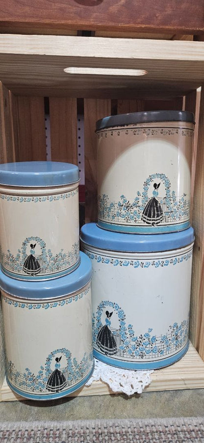 Vintage Tin Canister 4 Pc Set Southern Belle at Rose Trimmed Gate in Blue