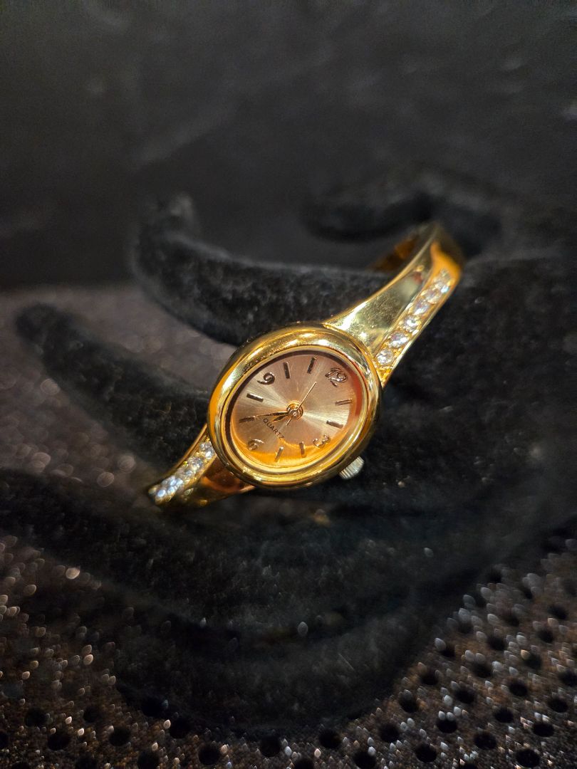Gold Tone Dial Oval Case MM Bar Style Crystal Accent Band watch