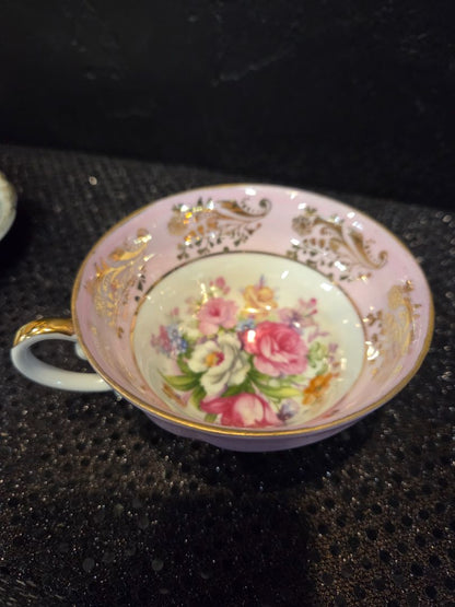 Royal Sealy 3 Foot Pink Lusterware Teacup and Saucer