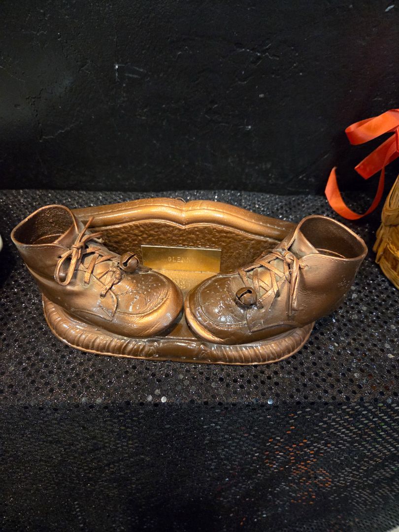 Vintage Bronze Baby Shoes on Shelf