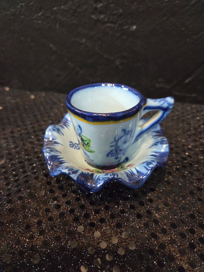 Hand painted teacup and saucer