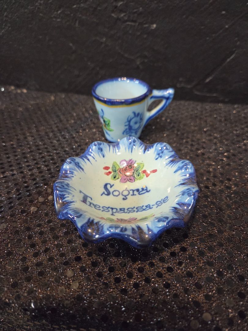 Hand painted teacup and saucer