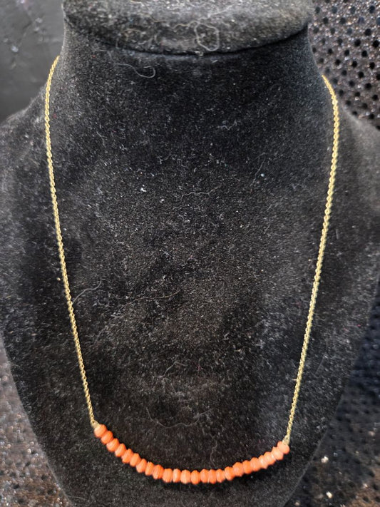 Gold Toned Necklace with orange beads