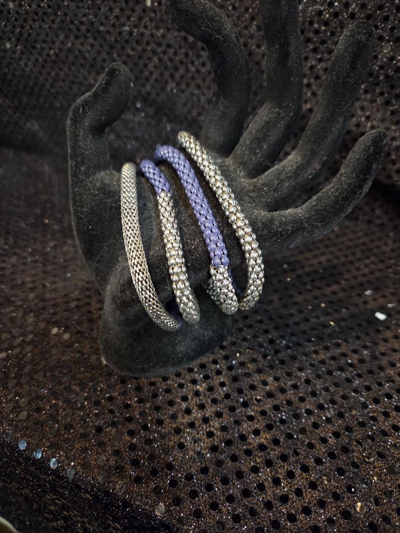 Set of 4 Silver ton and Blue Stretch Bracelets