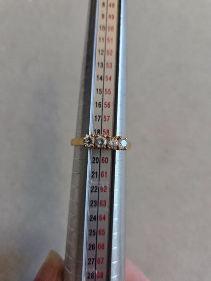 Gold tone 4 Rhinestone ring marked Korea size 8.75